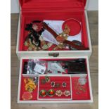 A box of costume jewellery.