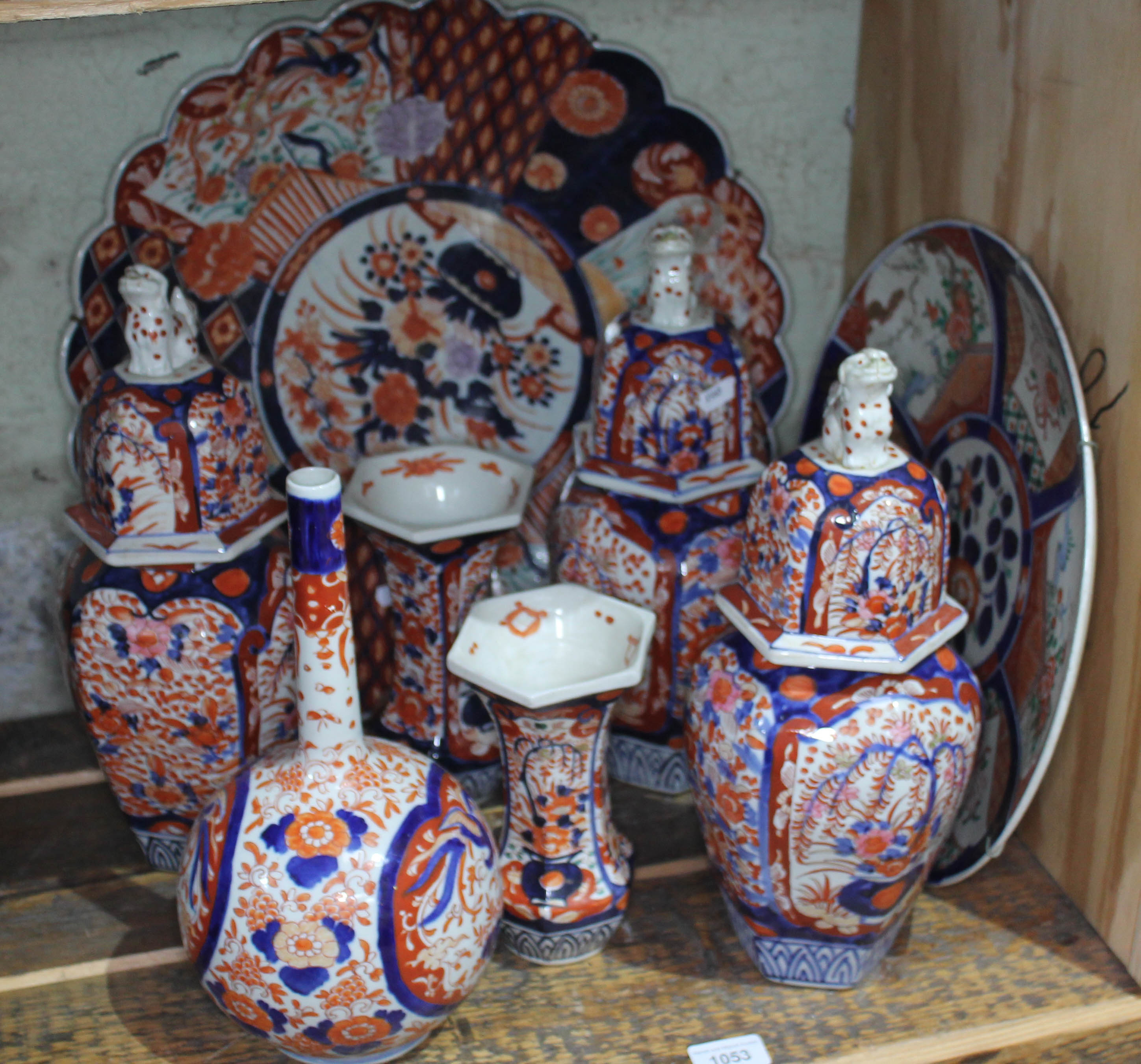 A collection of 8 pieces of Imari pottery, 19th century and modern, comprising two chargers and