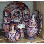 A collection of 8 pieces of Imari pottery, 19th century and modern, comprising two chargers and