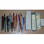 A quantity of mainly vintage pens including four with 14ct gold nibs.