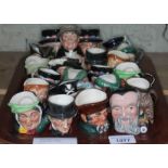 A collection of approx 22 small Royal Doulton character jugs including Merlin, Auld Mac, Sairey