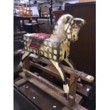 An antique rocking horse Catalogue only, live bidding available via our webiste. If you require P&