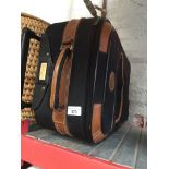 A wheelie luggage carrier. Catalogue only, live bidding available via our webiste. If you require