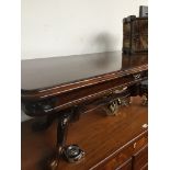 A carved oblong coffee table. Catalogue only, live bidding available via our webiste. If you require