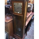 A long case clock with square steel dial, pendulum and weights Catalogue only, live bidding