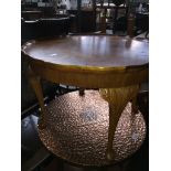 A round occasional table Catalogue only, live bidding available via our webiste. If you require P&