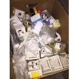 A box of switches, electrical items, etc. Catalogue only, live bidding available via our webiste. If