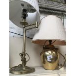A brass table lamp and another Catalogue only, live bidding available via our webiste. If you