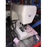 Electric Janome Jem 639 sewing machine with pedal and lead. Catalogue only, live bidding available