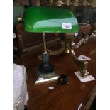 A green glass and brass desk lamp Catalogue only, live bidding available via our webiste. If you