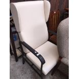 A hospital type wingback armchair Catalogue only, live bidding available via our webiste. If you