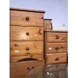 A pair of pine bedside cabinets Catalogue only, live bidding available via our webiste. If you