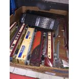 A box of model railway track and rolling stock Catalogue only, live bidding available via our