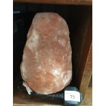A Taourirt natural salt lamp Catalogue only, live bidding available via our webiste. If you