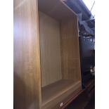 A light oak effect bookcase Catalogue only, live bidding available via our webiste. If you require