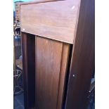 An Austinsuite teak wardrobe Catalogue only, live bidding available via our webiste. If you