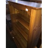 A pair of pine bookcases Catalogue only, live bidding available via our webiste. If you require P&