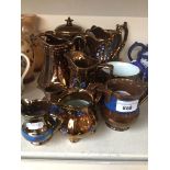 Various copper lustre jugs Catalogue only, live bidding available via our webiste. If you require