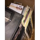 A box of 45s, CDs, a car radio, etc. Catalogue only, live bidding available via our webiste. If