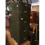 A vintage green metal four drawer filing cabinet Catalogue only, live bidding available via our