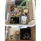 A small basket of costume jewellery Catalogue only, live bidding available via our webiste. If you