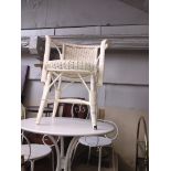 A white cane armchair Catalogue only, live bidding available via our webiste. If you require P&P