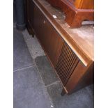 A retro music center in cabinet Catalogue only, live bidding available via our webiste. If you