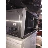 A Kenwood microwave Catalogue only, live bidding available via our webiste. If you require P&P