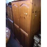 A pine wardrobe Catalogue only, live bidding available via our webiste. If you require P&P please