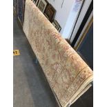 An eastern style beige carpet, 260cm x 158cm. Catalogue only, live bidding available via our