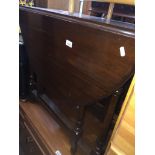 A mahogany gate leg drop leaf table Catalogue only, live bidding available via our webiste. If you