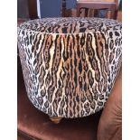 A leopard print stool Catalogue only, live bidding available via our webiste. If you require P&P