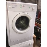 An Indesit dryer. Catalogue only, live bidding available via our webiste. If you require P&P