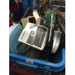 A box of kitchen items, handheld vac, lava lamp, baking trays, extension lead, etc. Catalogue