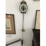 A German skeleton pendulum wall clock, retailed by Brights of Nettlebed. Catalogue only, live