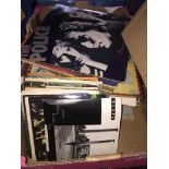 A box of vinyl Lps and singles Catalogue only, live bidding available via our webiste. If you