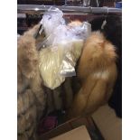 3 fur jackets and a stole, one being red fox fur, one with leather "interlocking" strips.