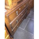 A 2 over 2 oak chest of drawers Catalogue only, live bidding available via our webiste. If you