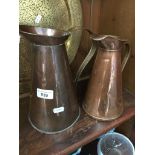 Two copper jugs Catalogue only, live bidding available via our webiste. If you require P&P please