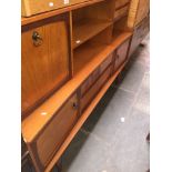 A retro teak highboard Catalogue only, live bidding available via our webiste. If you require P&P