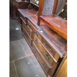 An early 20th century mahogany and walnut veneered breakfront mirror back sideboard Catalogue