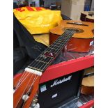 A Herald acoustic guitar with soft case Catalogue only, live bidding available via our webiste. If