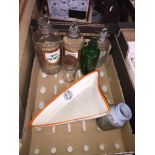A box containing chemist's bottles and some pottery Catalogue only, live bidding available via our