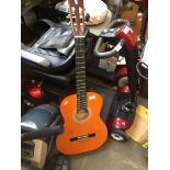 A Hohner MC-05 acoustic guitar Catalogue only, live bidding available via our webiste. If you