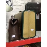 A hard shell suitcase and another case. Catalogue only, live bidding available via our webiste. If