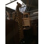 A novelty leopard cd/dvd/bookcase cabinet Catalogue only, live bidding available via our webiste. If