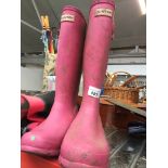 A pair of pink Hunter wellies, size UK4 and a wetsuit. Catalogue only, live bidding available via