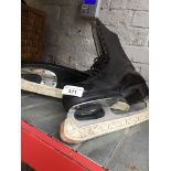 A pair of vintage leather ice skates. Catalogue only, live bidding available via our webiste. If you