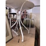 A metal white patio table and two chairs Catalogue only, live bidding available via our webiste.