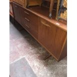 A mid 20th century teak sideboard Catalogue only, live bidding available via our webiste. If you